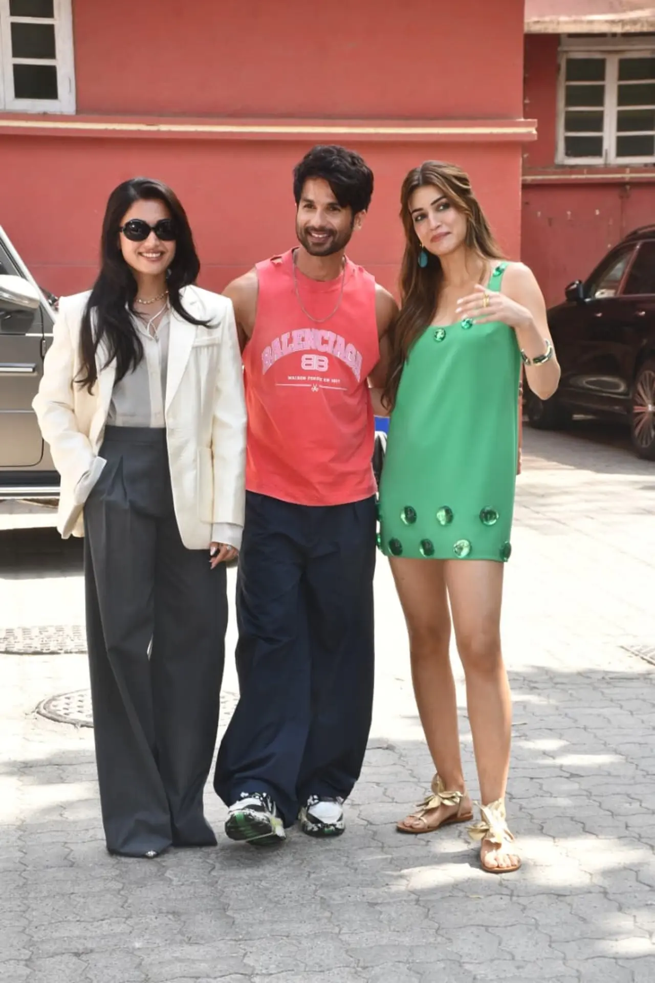 Shahid Kapoor, Rashmika Mandanna, and Kriti Sanon struck stylish poses together as they flashed bright smiles for the paparazzi. Shahid Kapoor, Rashmika Mandanna, and Kriti Sanon struck stylish poses together as they flashed bright smiles for the paparazzi.